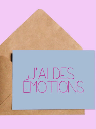 OUI MANON Carte - J'ai des émotions, inscription en rose sur un fond bleu. Fait localement à Montréal.