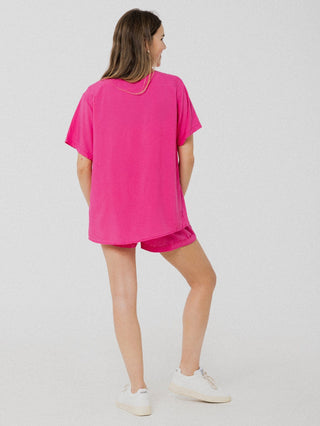 Blouse rose bonbon légère, ample et confortable à manche courte. Designer québécois.